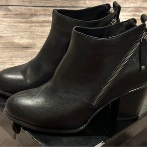 Torrid black zip up booties